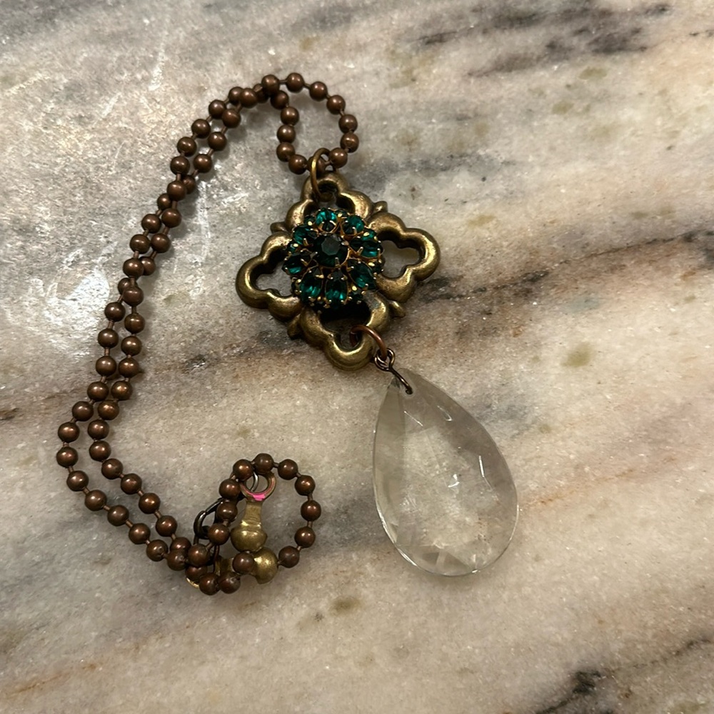 Medal beaded bronze necklace with green glass stone and crystal pendant